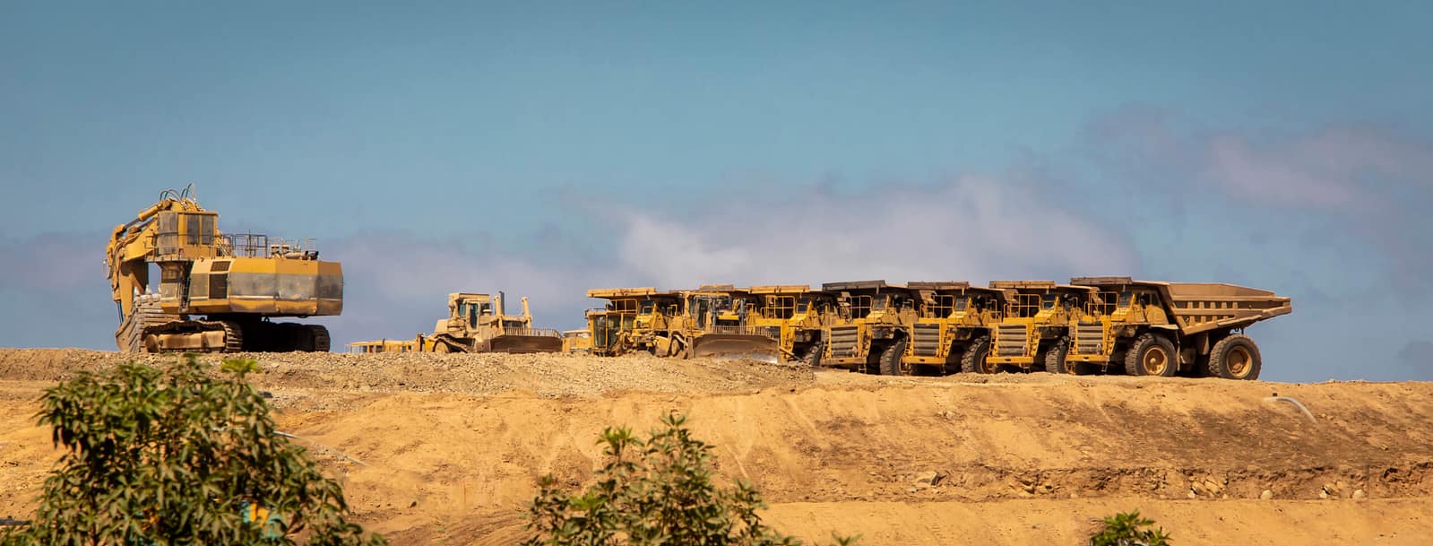 Heavy equipment and trucks at an Australian worksite financed by a chattel mortgage