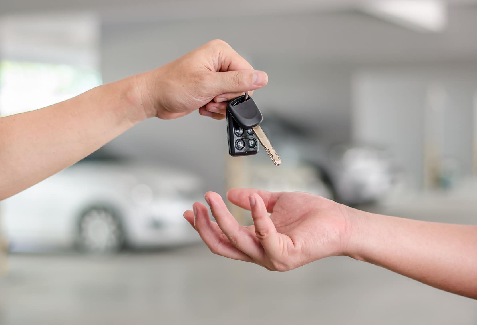 Car Finance Cairns: Dealer Finance, Private Sales and Broker-Arranged Loans Compared 2 Seller handing car keys to a buyer in a private car sale